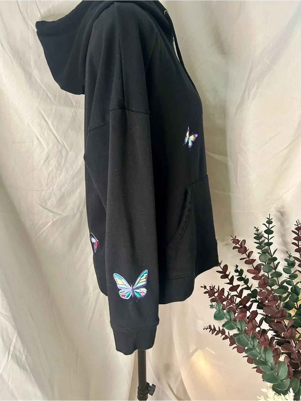 Women's Black Pullover Hoodie with Colorful Butterfly Accents